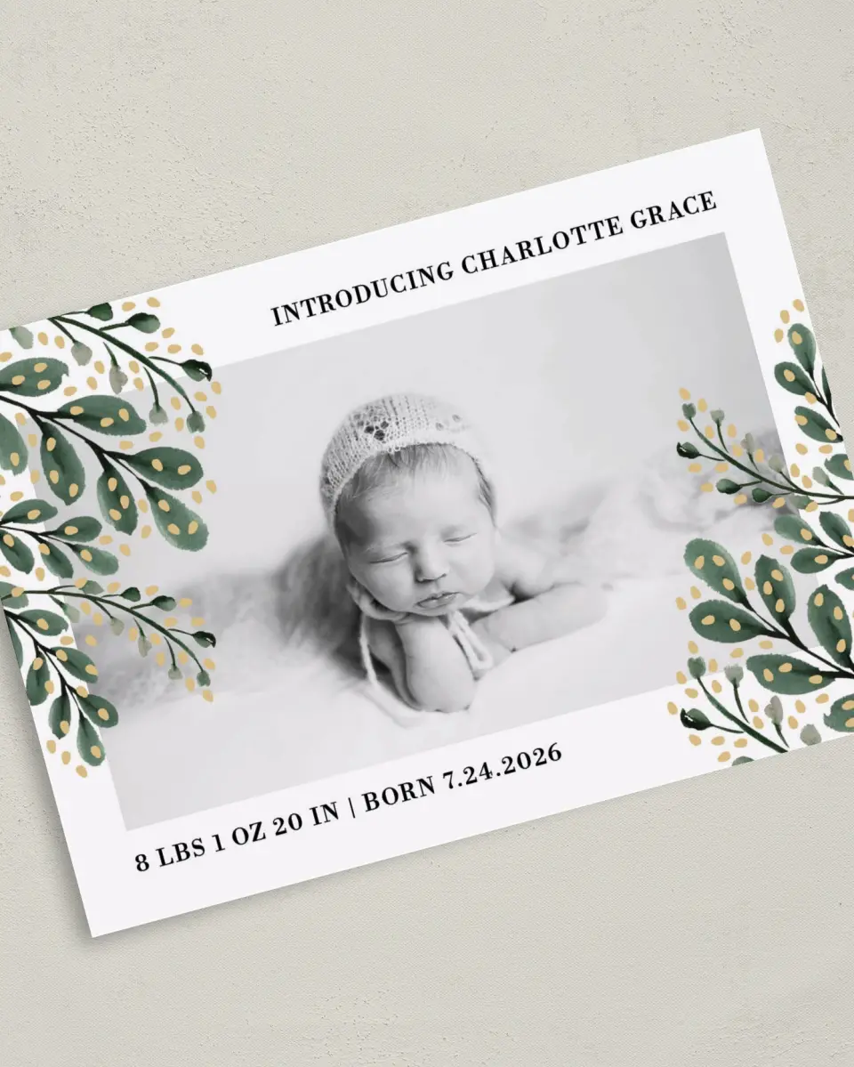 This is a 5" x 7" Birth Announcement Card called Laurel Love printed in full color with Silver foil on Luxe Satin (coated) paper