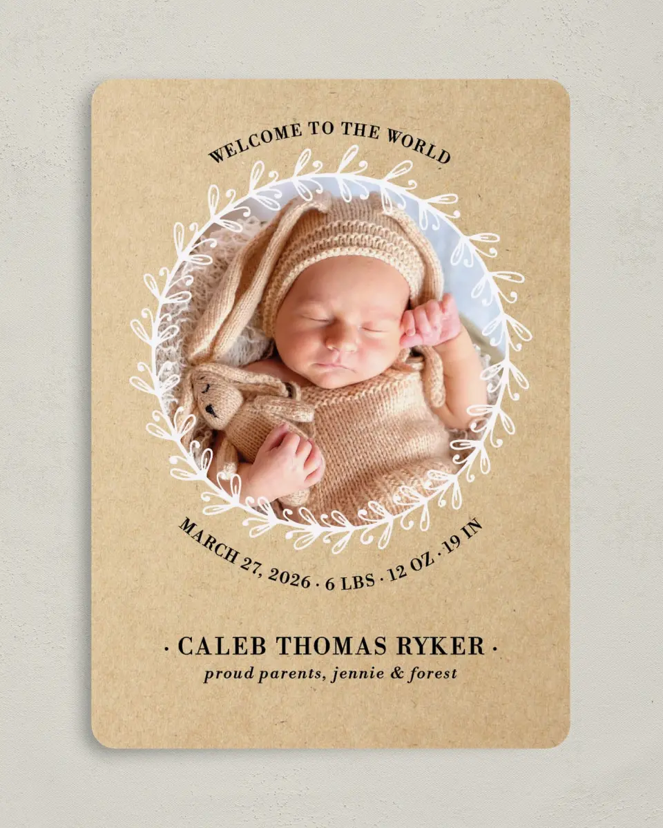 This is a 5" x 7" Birth Announcement Card called Sweet Wreath printed in full color with Silver foil on Luxe Satin (coated) paper