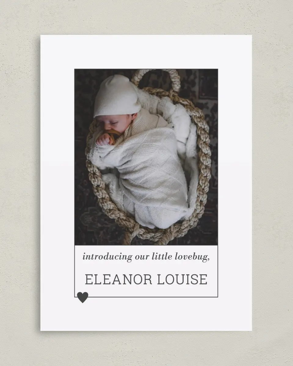 This is a 5" x 7" Birth Announcement Card called Heart of Love printed in full color with Silver foil on Luxe Satin (coated) paper