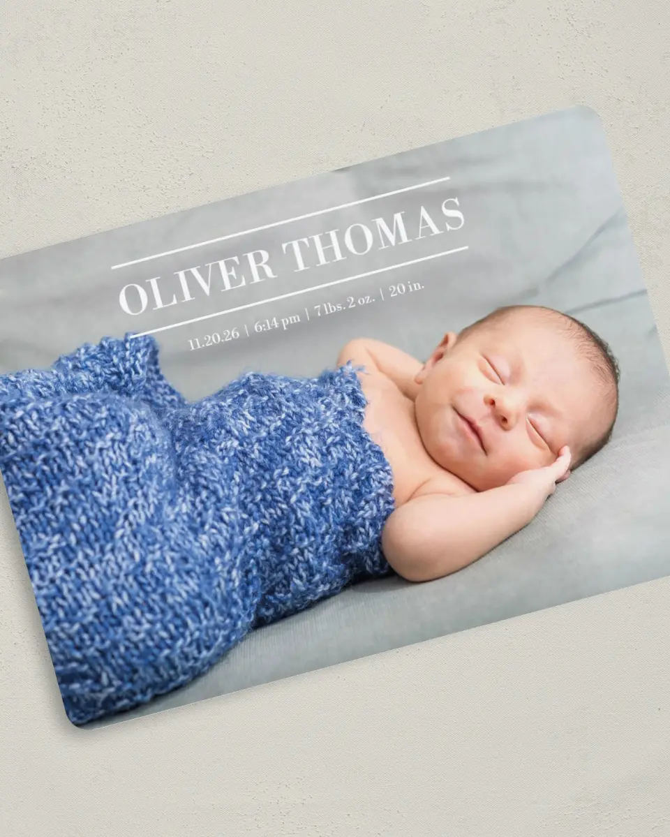 This is a 5" x 7" Birth Announcement Card called Grand Introduction printed in full color with Silver foil on Luxe Satin (coated) paper