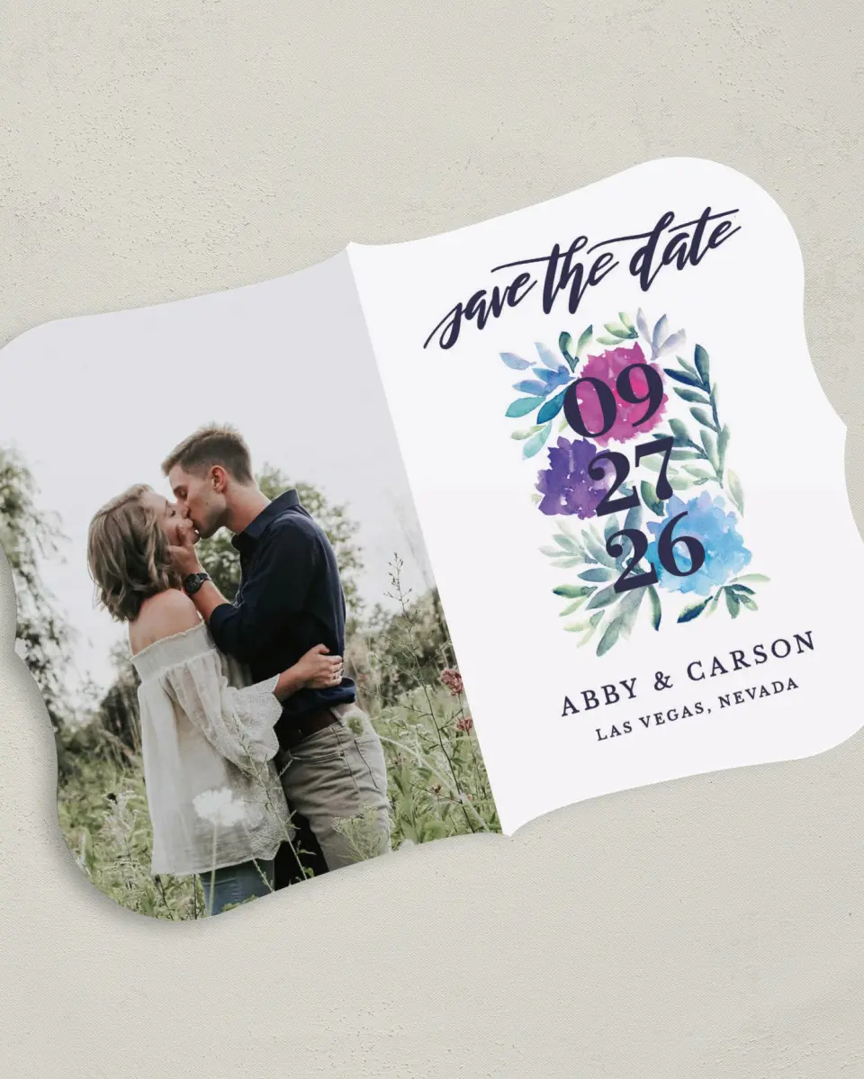 This is a 5" x 7" Save the Date Card called Kissing Charm printed in full color on Premium Smooth paper