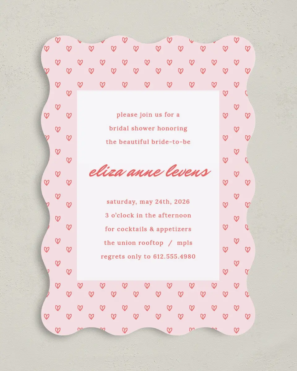 This is a 5" x 7" Bridal Shower Invitation called Hearts Aplenty printed in full color with Rose Gold foil on Luxe Satin (coated) paper