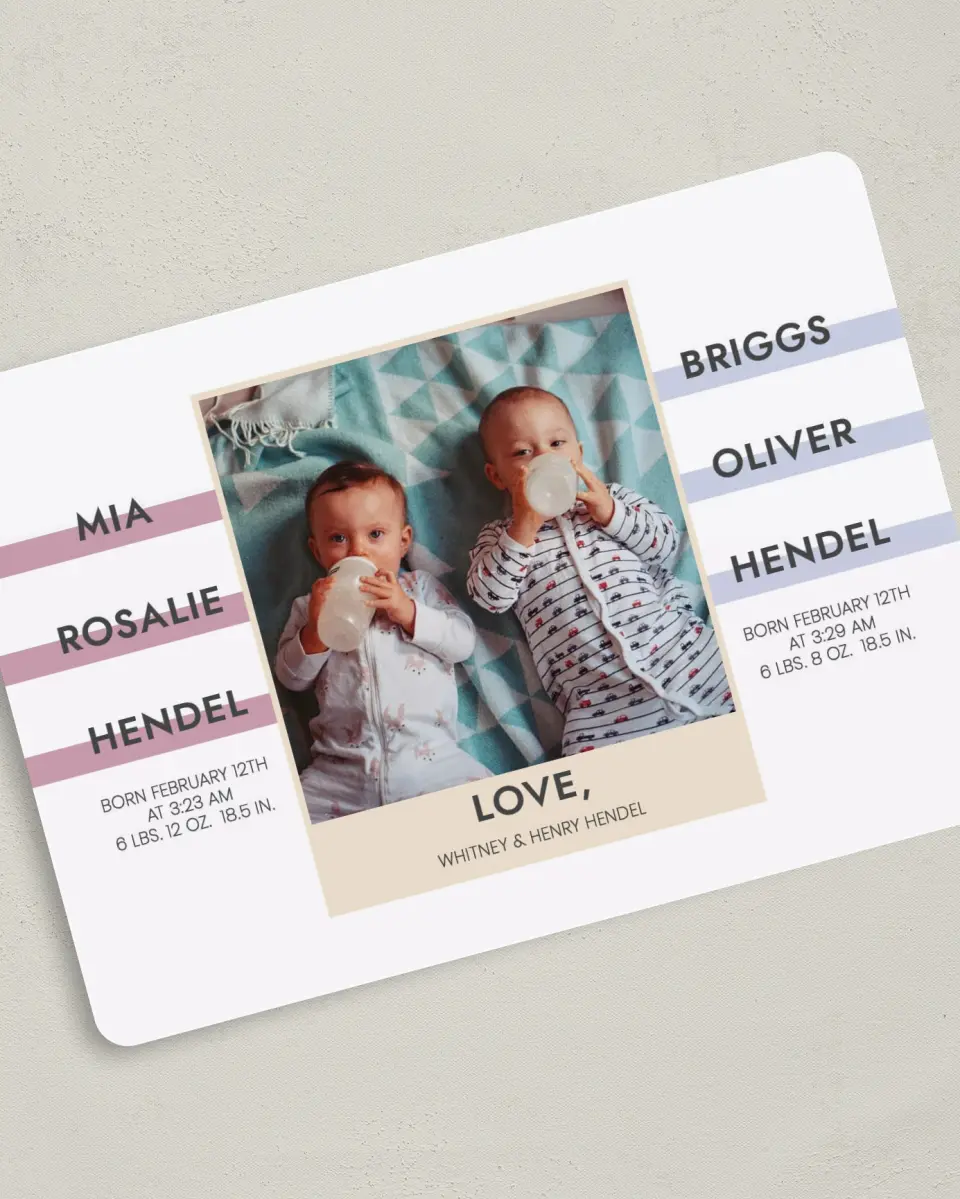 This is a 5" x 7" Birth Announcement Card called Two News printed in full color with Silver foil on Luxe Satin (coated) paper