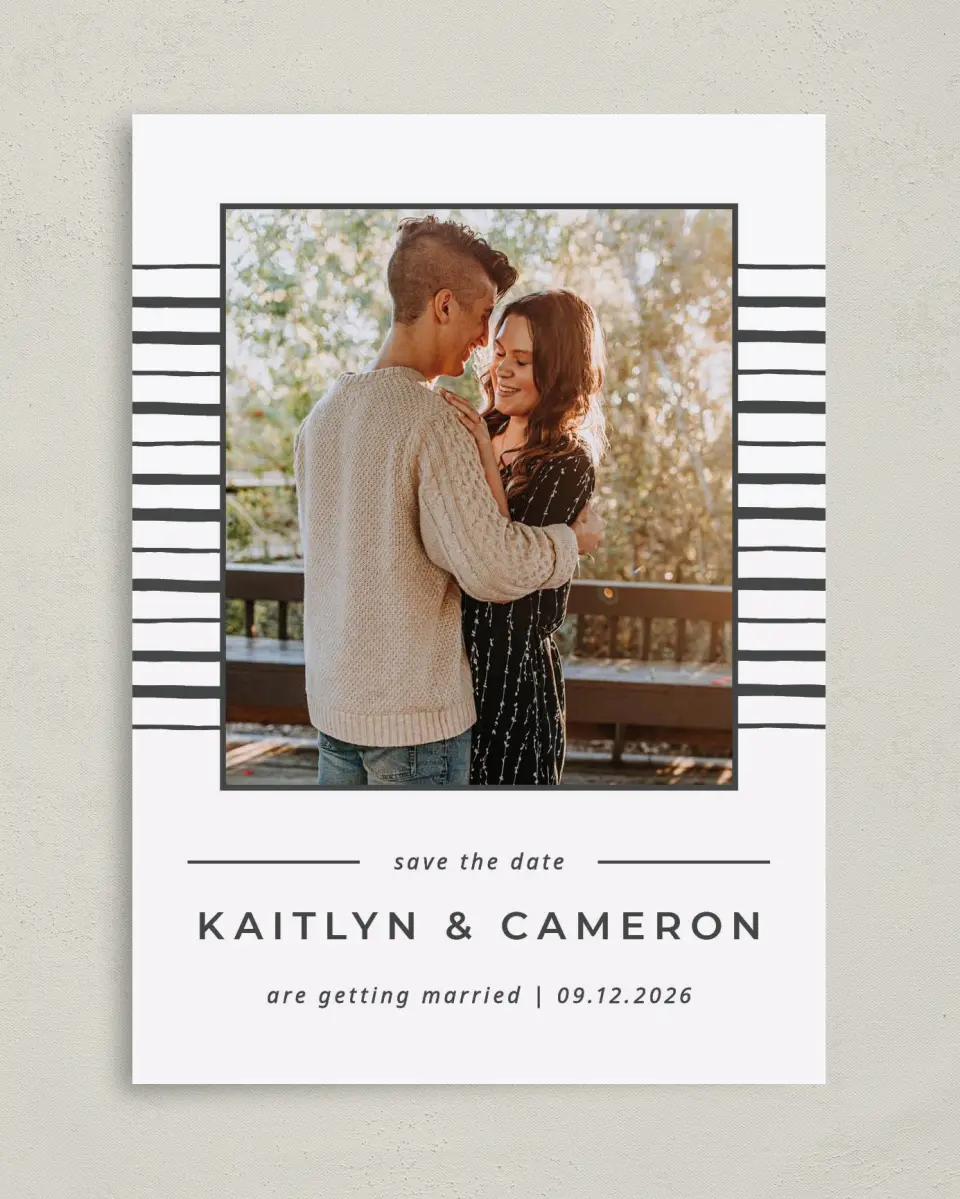 This is a 5" x 7" Save the Date Card called Love on the Line printed in full color on Premium Smooth paper
