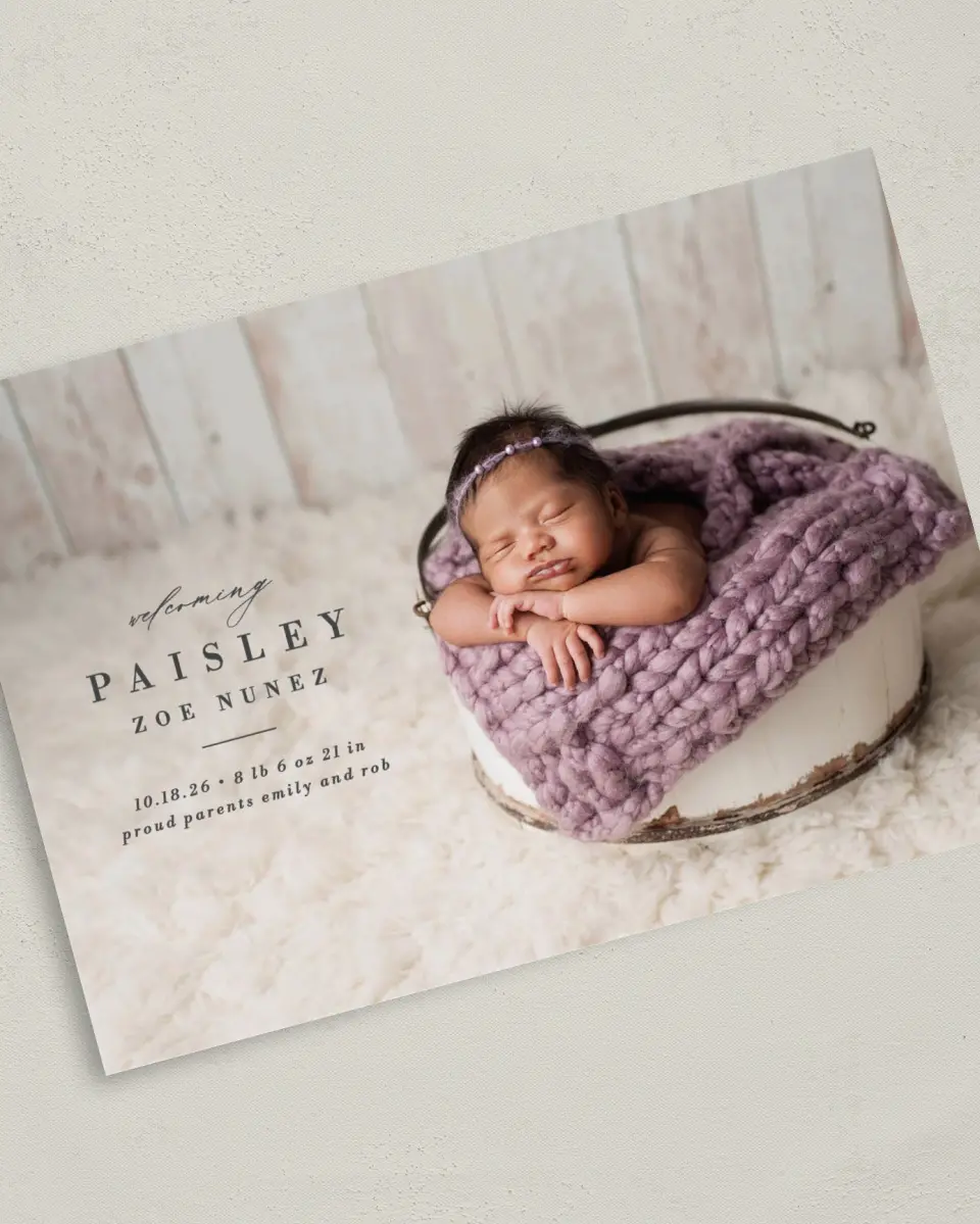 This is a 5" x 7" Birth Announcement Card called Adored printed in full color with Silver foil on Luxe Satin (coated) paper
