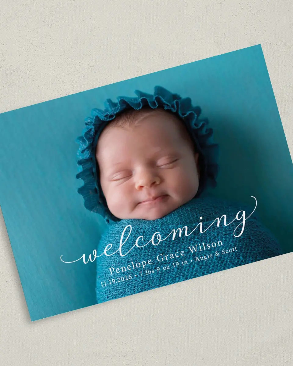 This is a 5" x 7" Birth Announcement Card called Darling Welcome printed in full color with Silver foil on Luxe Satin (coated) paper