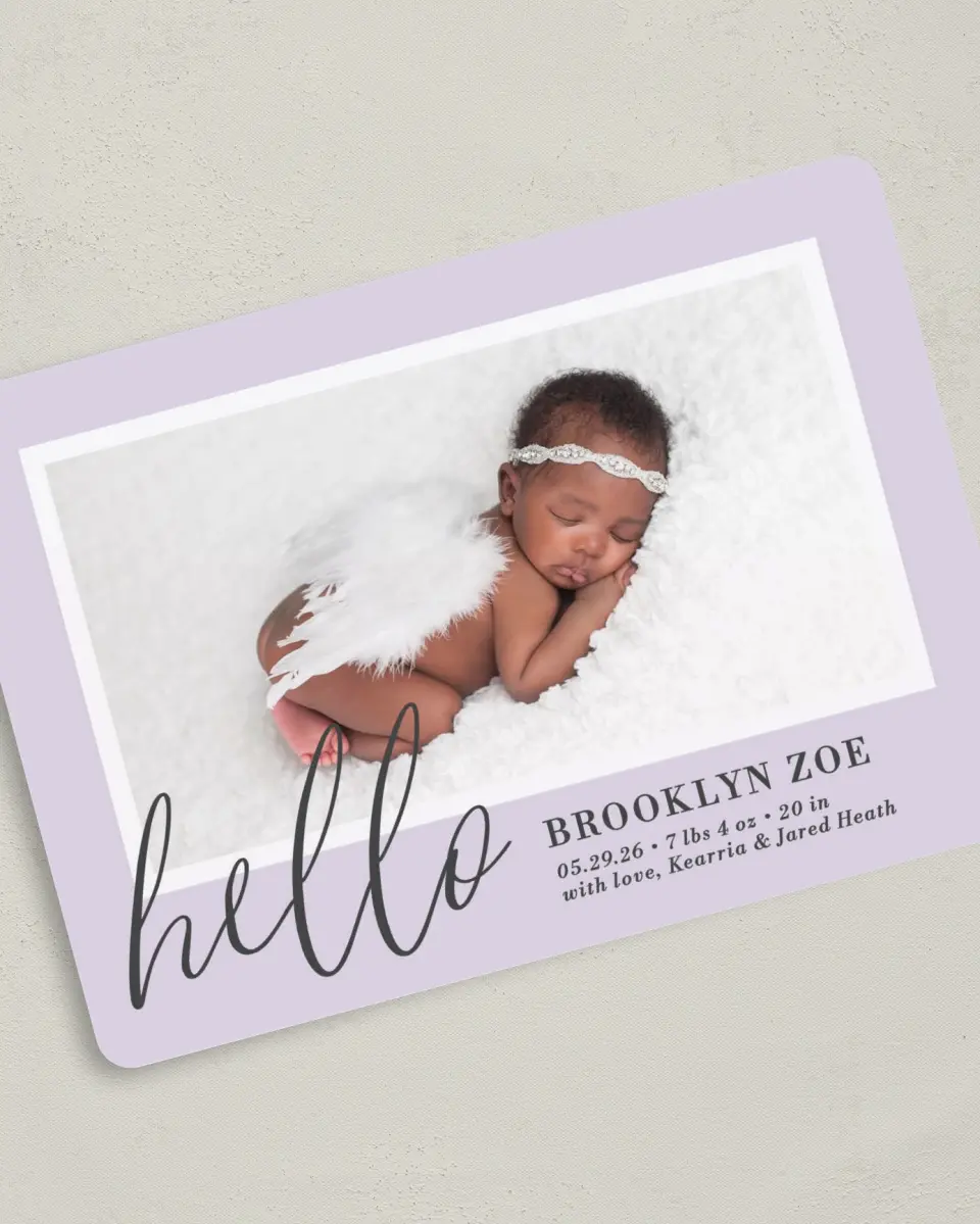 This is a 5" x 7" Birth Announcement Card called Chic Hello printed in full color with Silver foil on Luxe Satin (coated) paper