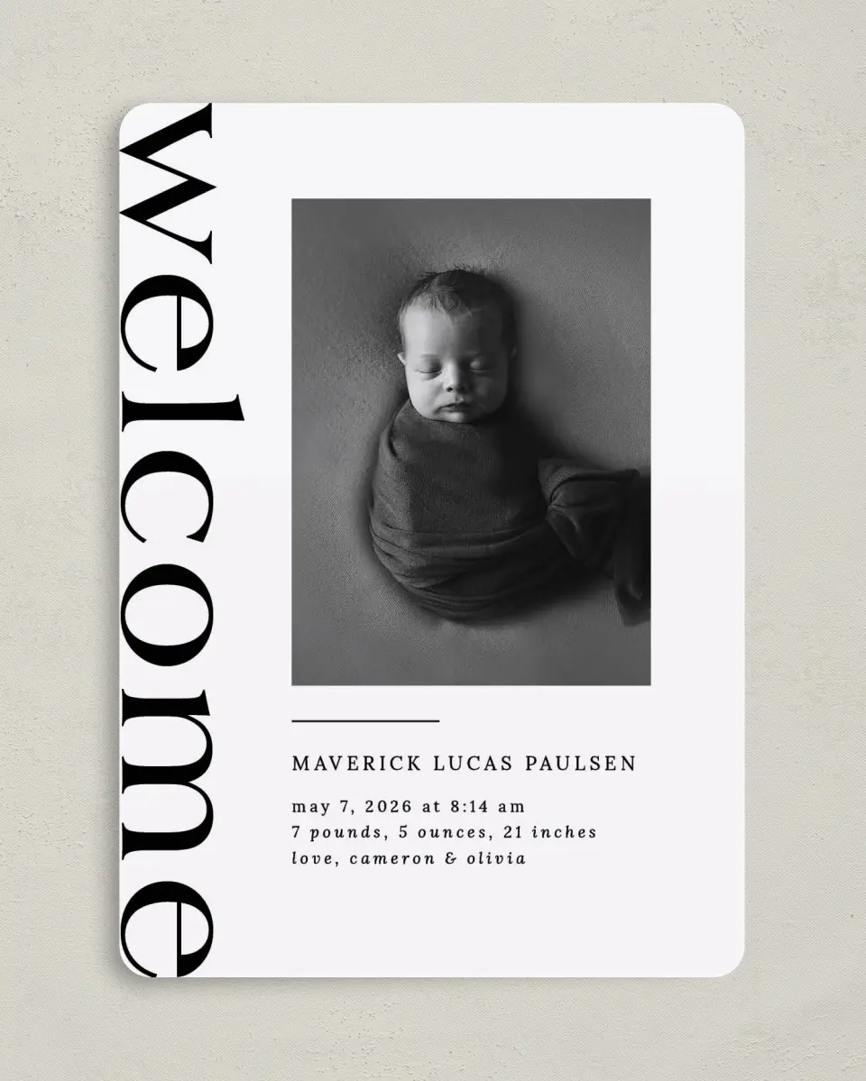 This is a 5" x 7" Birth Announcement Card called Bold Welcome printed in full color with Silver foil on Luxe Satin (coated) paper