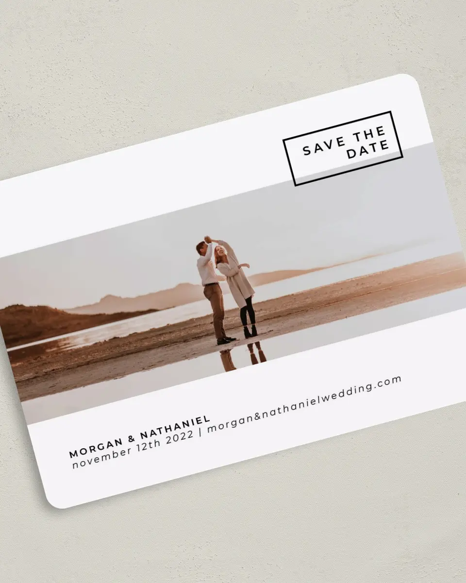 This is a 5" x 7" Save the Date Card called Passionate Panorama printed in full color with Silver foil on Luxe Satin (coated) paper
