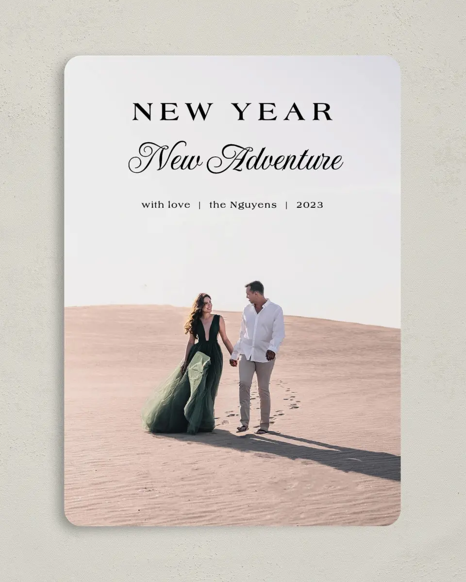 This is a 5" x 7" Christmas Card called Year of Adventure printed in full color with Gold foil on Soft Suede (coated) paper
