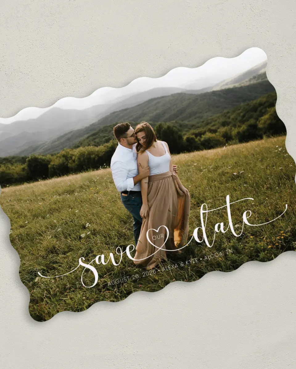 This is a 5" x 7" Save the Date Card called Entwined Heart printed in full color with Rose Gold foil on Luxe Satin (coated) paper