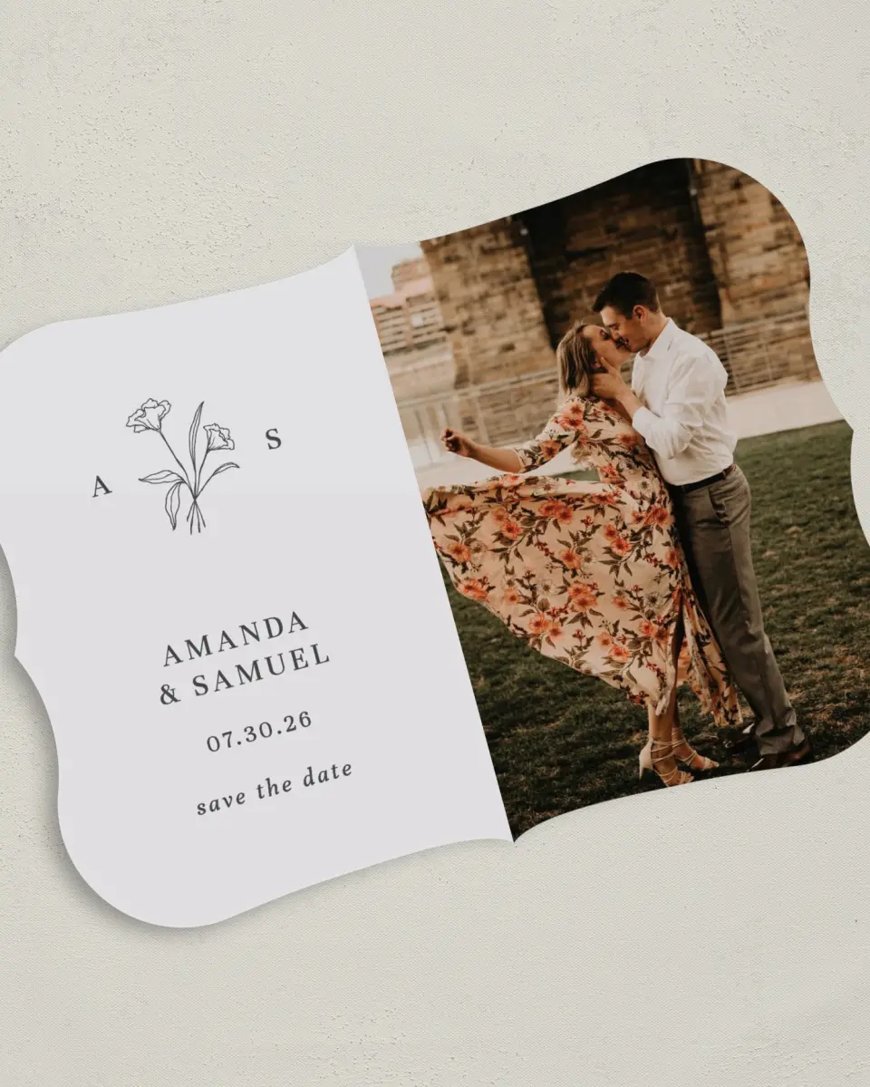 This is a 5" x 7" Save the Date Card called Monogram Bloom printed in full color on Premium Smooth paper