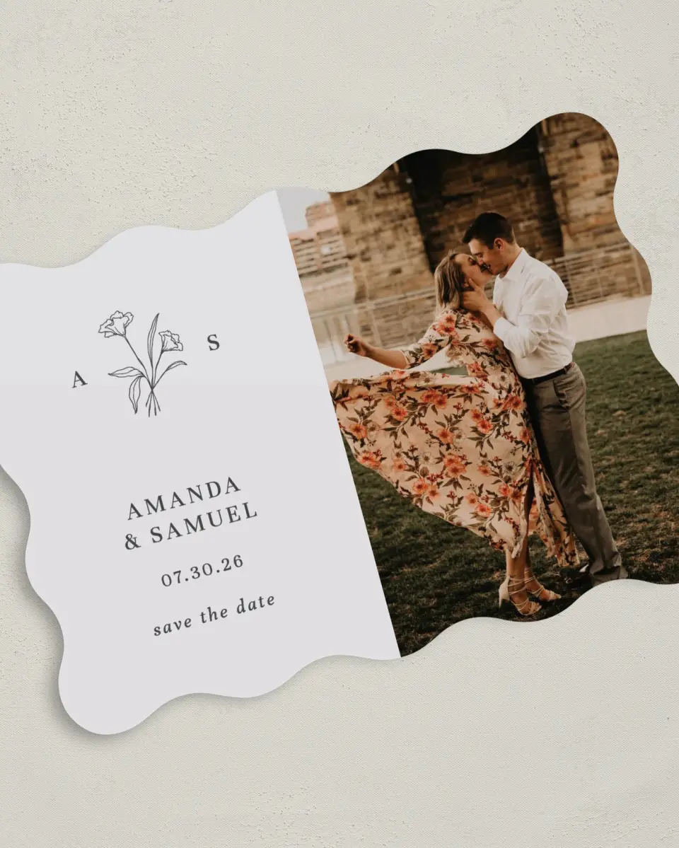 This is a 5" x 7" Save the Date Card called Monogram Bloom printed in full color on Premium Smooth paper