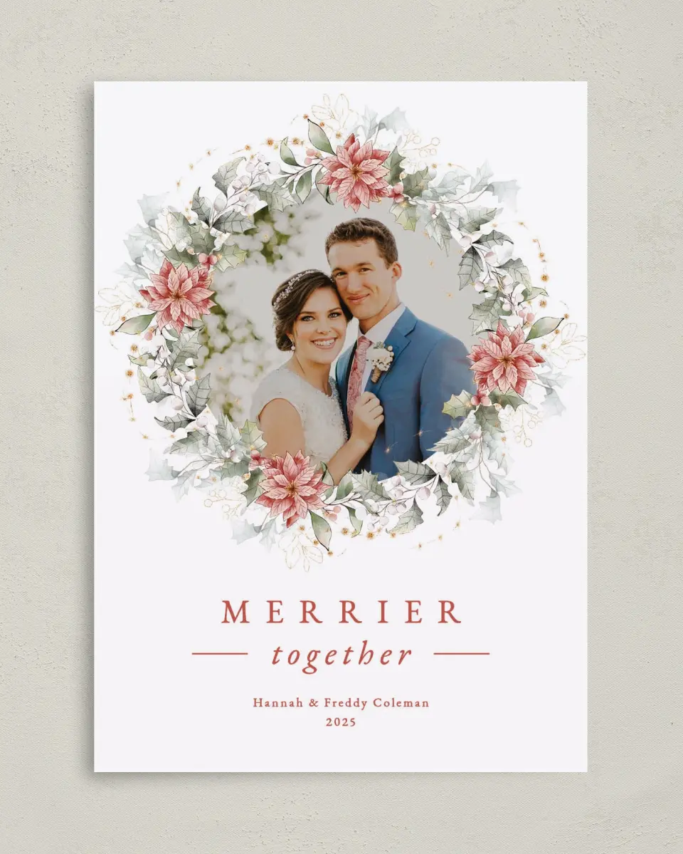 This is a 5" x 7" Christmas Card called Poinsettia Wreath printed in full color with Rose Gold foil on Soft Suede (coated) paper