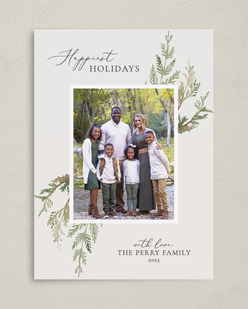 This is a 5" x 7" Christmas Card called Wintergreen Wishes printed in full color with Rose Gold foil on Soft Suede (coated) paper