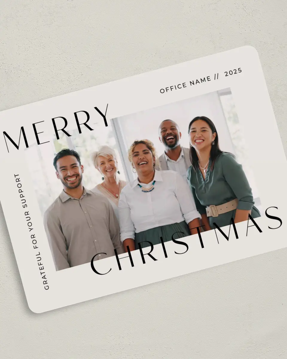 This is a 5" x 7" Christmas Card called Office Christmas printed in full color with Rose Gold foil on Soft Suede (coated) paper