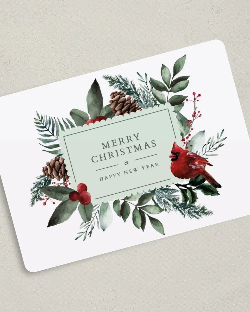 This is a 5" x 7" Christmas Card called Christmas Cardinal printed in full color with Rose Gold foil on Soft Suede (coated) paper