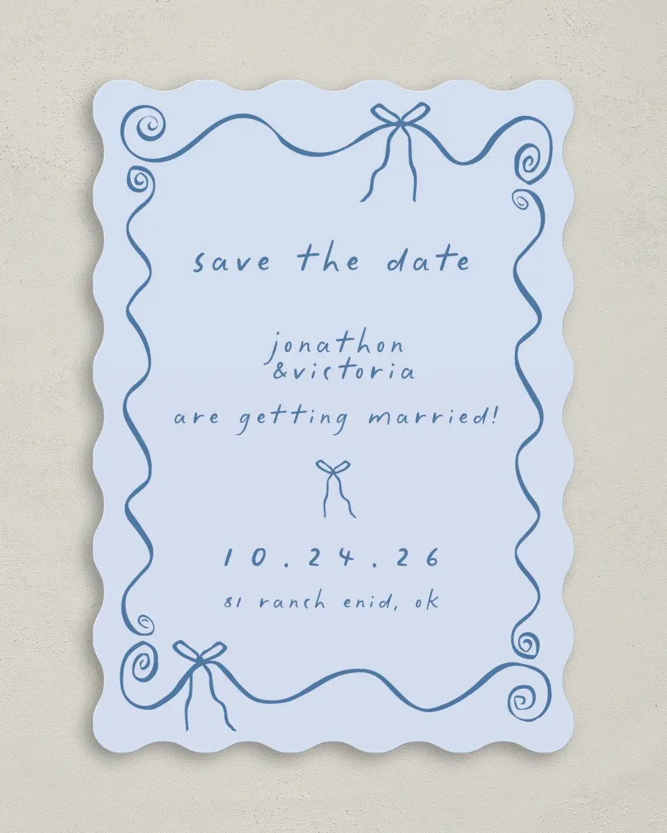 This is a 5" x 7" Save the Date Card called Ribbon Kisses printed in full color on Premium Smooth paper