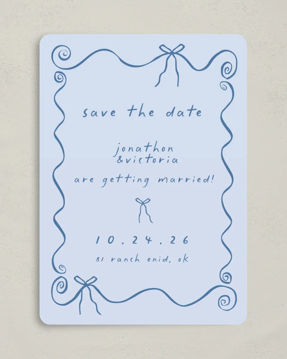 This is a 5" x 7" Save the Date Card called Ribbon Kisses printed in full color on Premium Smooth paper