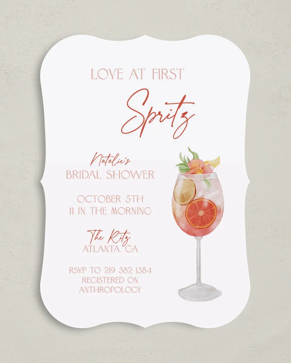 This is a 5" x 7" Bridal Shower Invitation called Love at First Spritz printed in full color with Rose Gold foil on Luxe Satin (coated) paper
