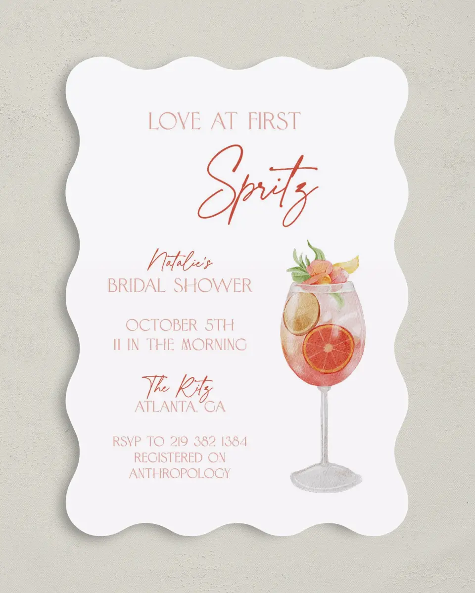This is a 5" x 7" Bridal Shower Invitation called Love at First Spritz printed in full color with Gold foil on Luxe Satin (coated) paper