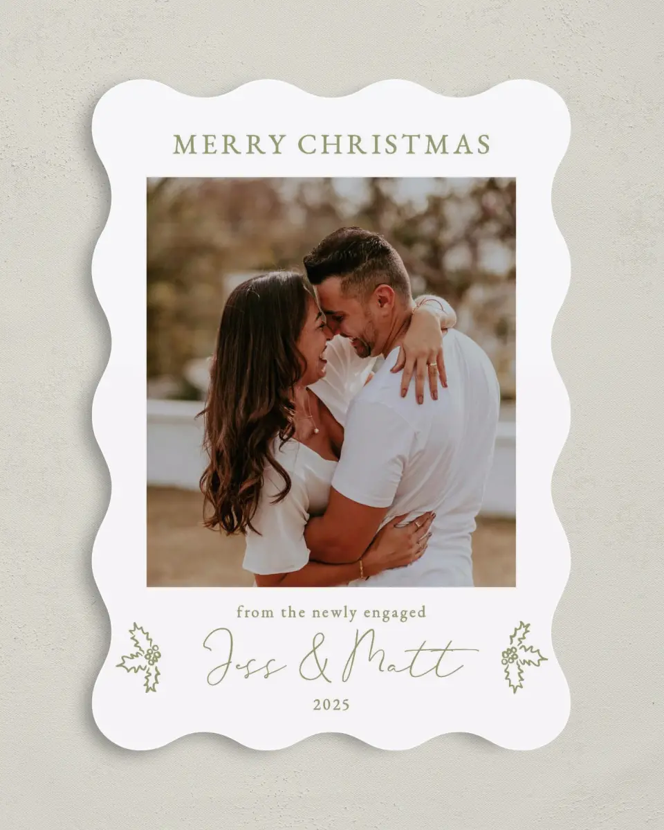 This is a 5" x 7" Christmas Card called Festive Fiancés printed in full color with Rose Gold foil on Soft Suede (coated) paper