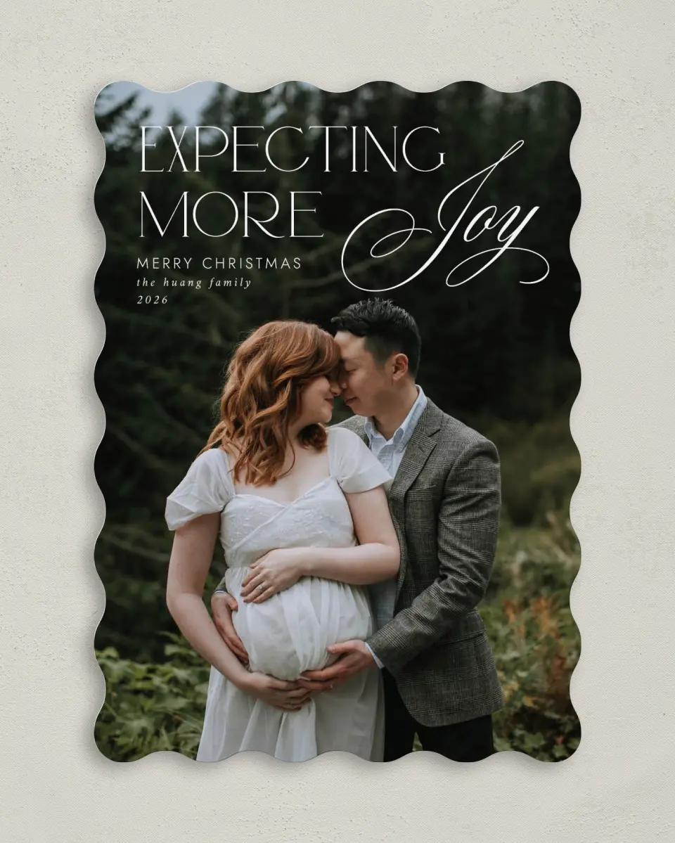 This is a 5" x 7" Christmas Card called More Joy printed in full color with Rose Gold foil on Soft Suede (coated) paper