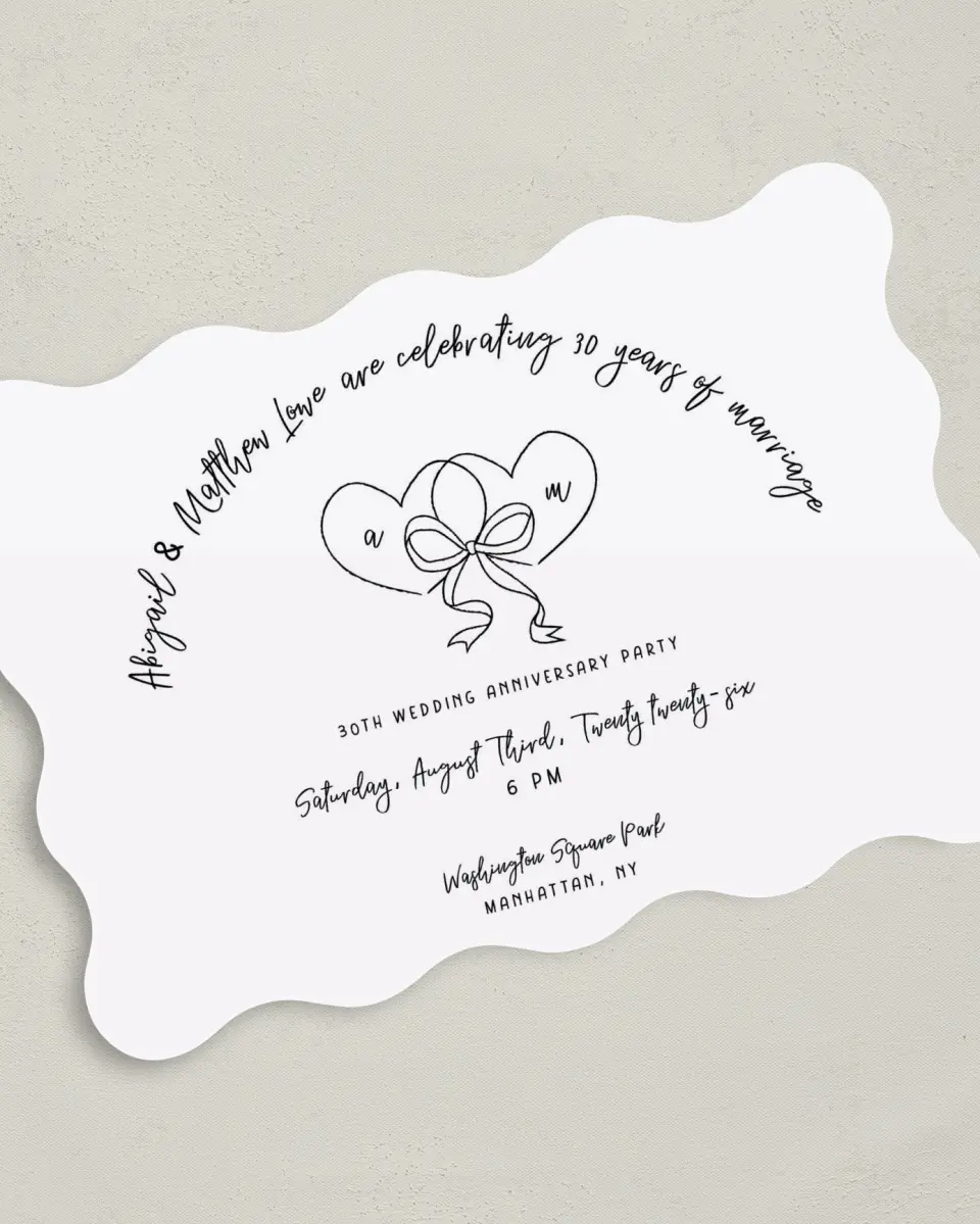 This is a 5" x 7" Anniversary Invitation called Two Hearts printed in full color with Silver foil on Luxe Satin (coated) paper