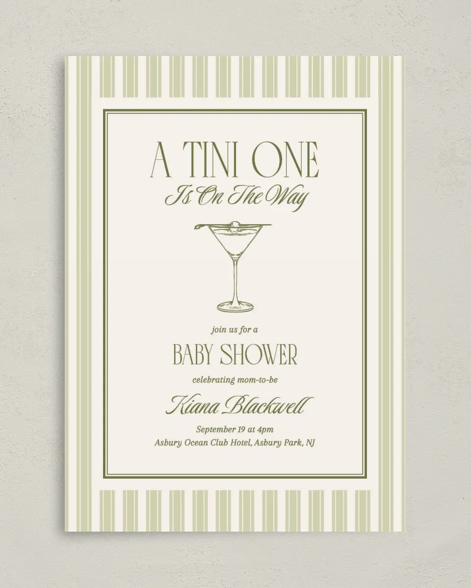 This is a 5" x 7" Baby Shower Invitation called A Tini One printed in full color with Rose Gold foil on Luxe Satin (coated) paper
