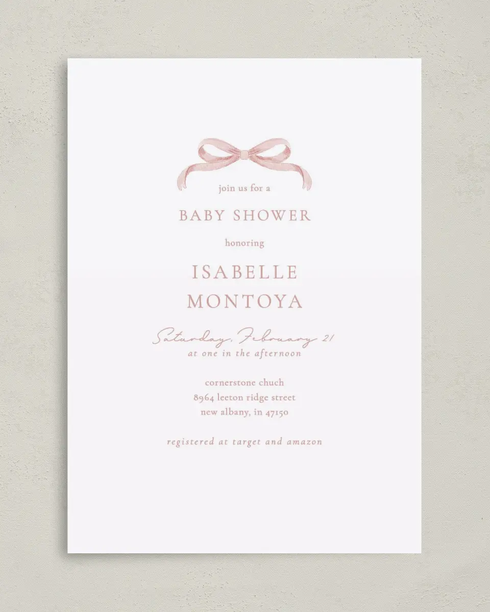 This is a 5" x 7" Baby Shower Invitation called Bitty Bow printed in full color with Rose Gold foil on Luxe Satin (coated) paper