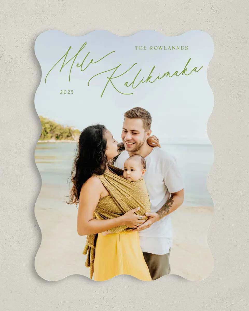 This is a 5" x 7" Christmas Card called Mele Kalikimaka printed in full color with Rose Gold foil on Soft Suede (coated) paper