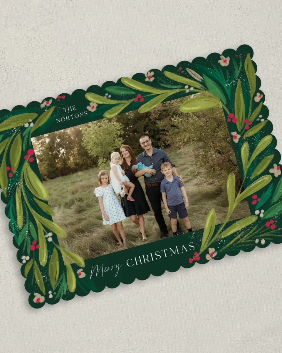 This is a 5" x 7" Christmas Card called Merry Botanicals printed in full color with Gold foil on Premium Smooth paper on Premium Smooth paper on Premium Smooth paper