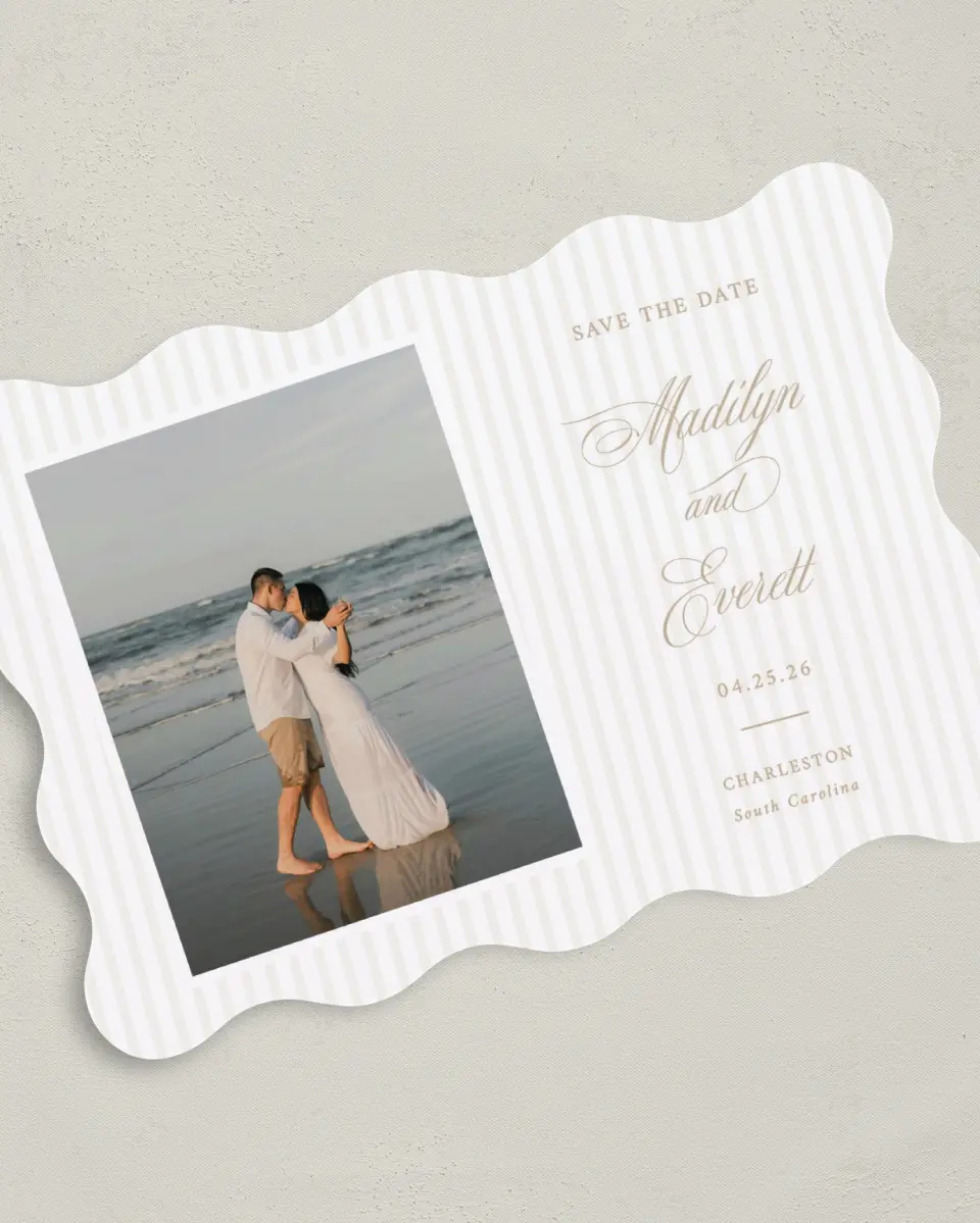 This is a 5" x 7" Save the Date Card called Elegant Shell printed in full color with Silver foil on Luxe Satin (coated) paper