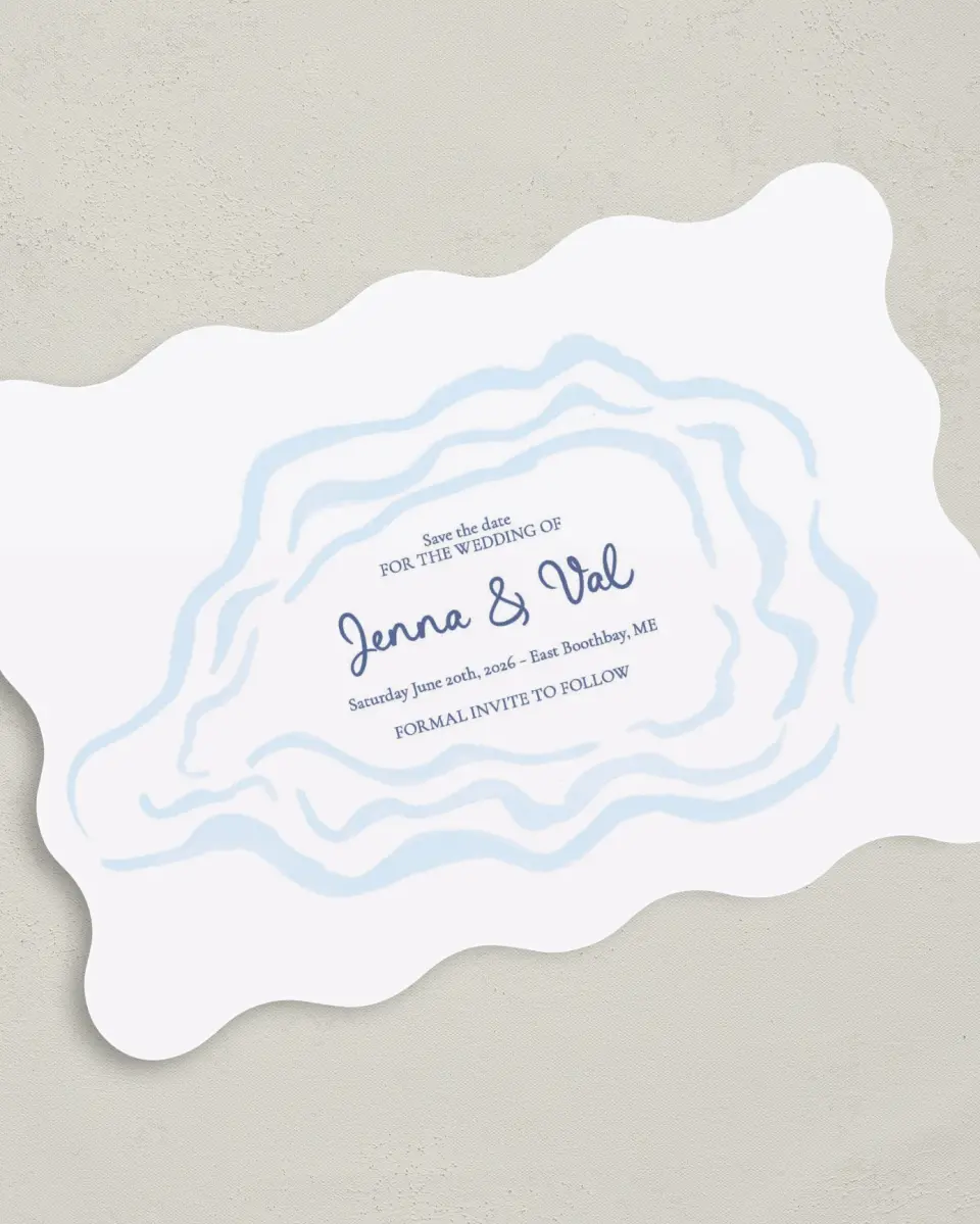 This is a 5" x 7" Save the Date Card called Love by the Sea printed in full color with Silver foil on Luxe Satin (coated) paper