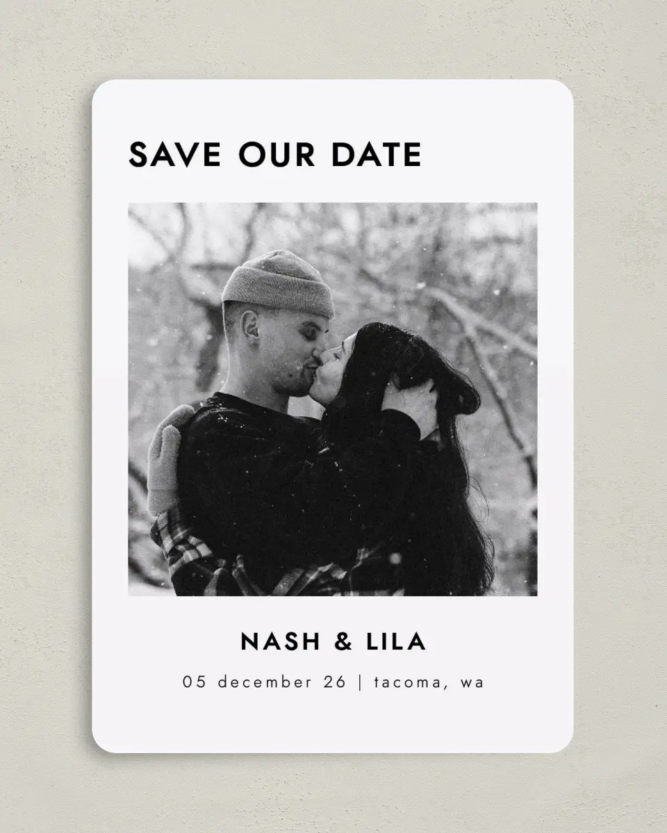 This is a 5" x 7" Save the Date Card called Snowy Kisses printed in full color with Gold foil on Premium Smooth paper