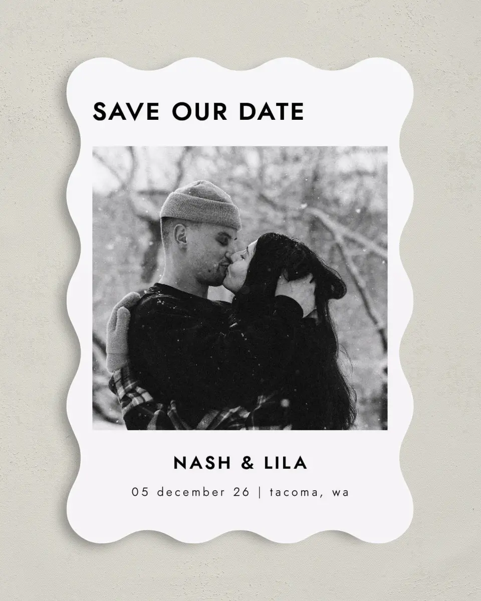 This is a 5" x 7" Save the Date Card called Snowy Kisses printed in full color with Gold foil on Premium Smooth paper