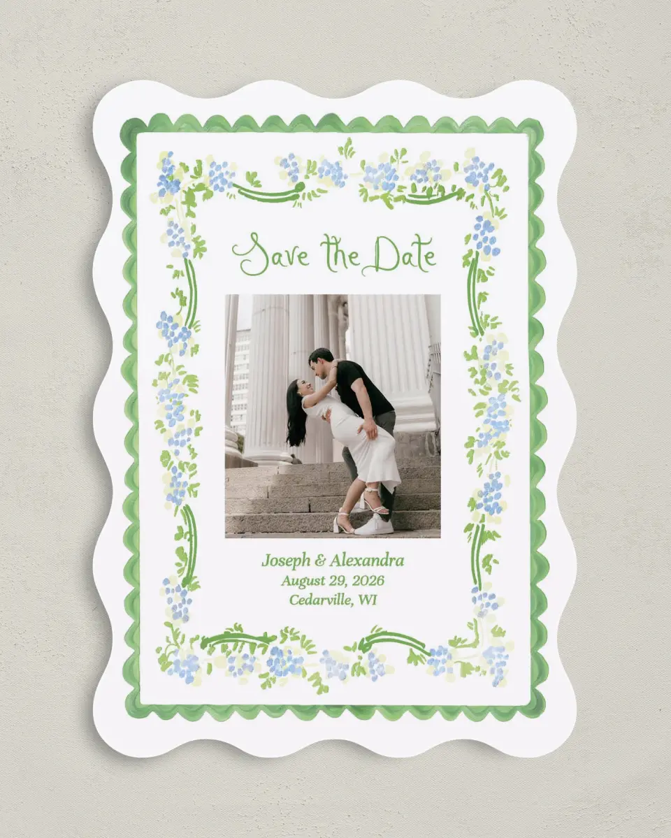 This is a 5" x 7" Save the Date Card called Flower Frame printed in full color with Silver foil on Luxe Satin (coated) paper