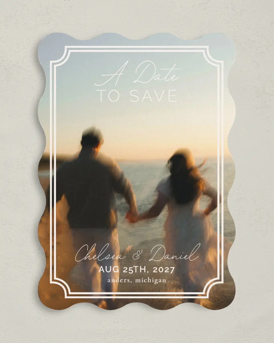 This is a 5" x 7" Save the Date Card called The Chelsea printed in full color with Silver foil on Luxe Satin (coated) paper