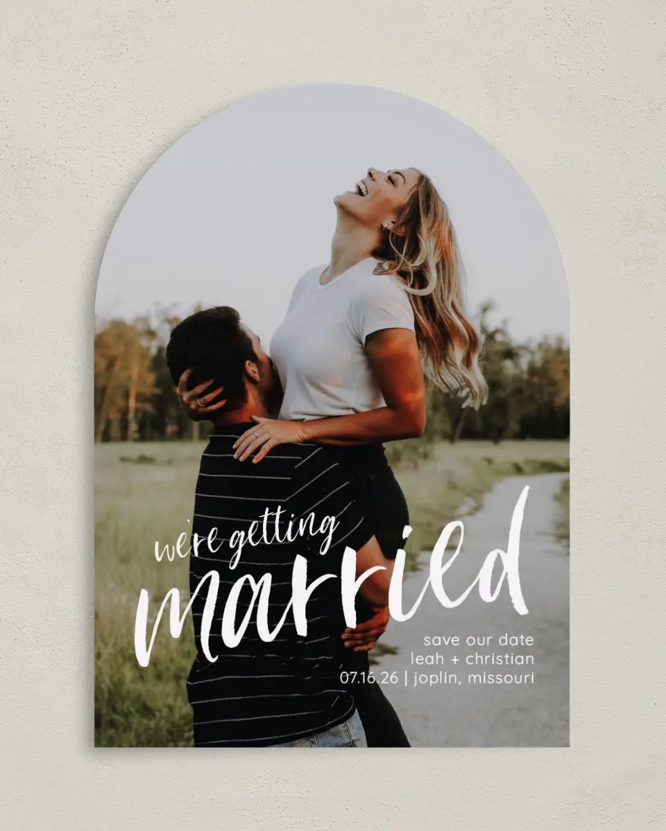 This is a 5" x 7" Arch Save the Date called Exciting News printed in full color on Premium Smooth paper