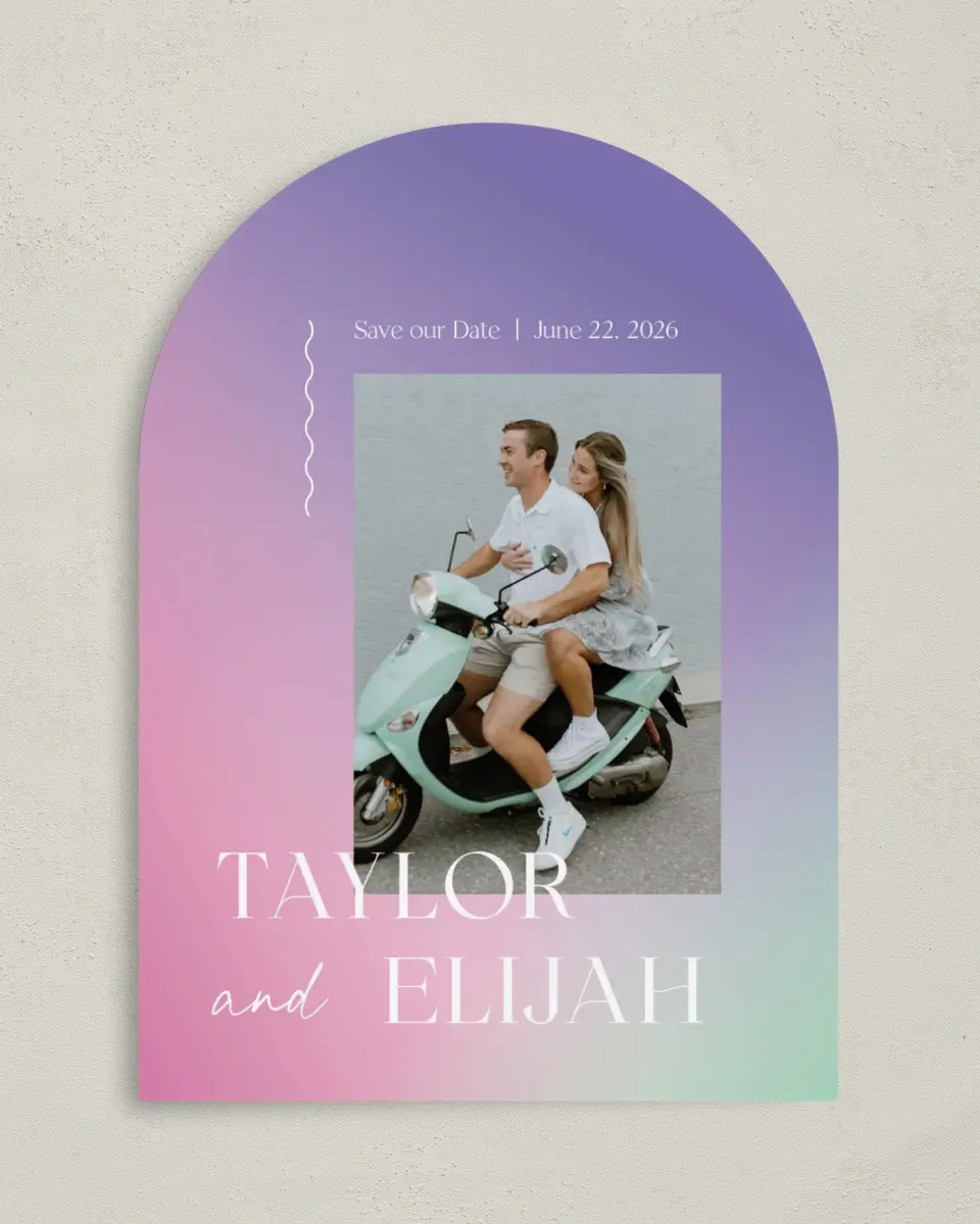 This is a 5" x 7" Arch Save the Date called The Taylor printed in full color with Silver foil on Luxe Satin paper