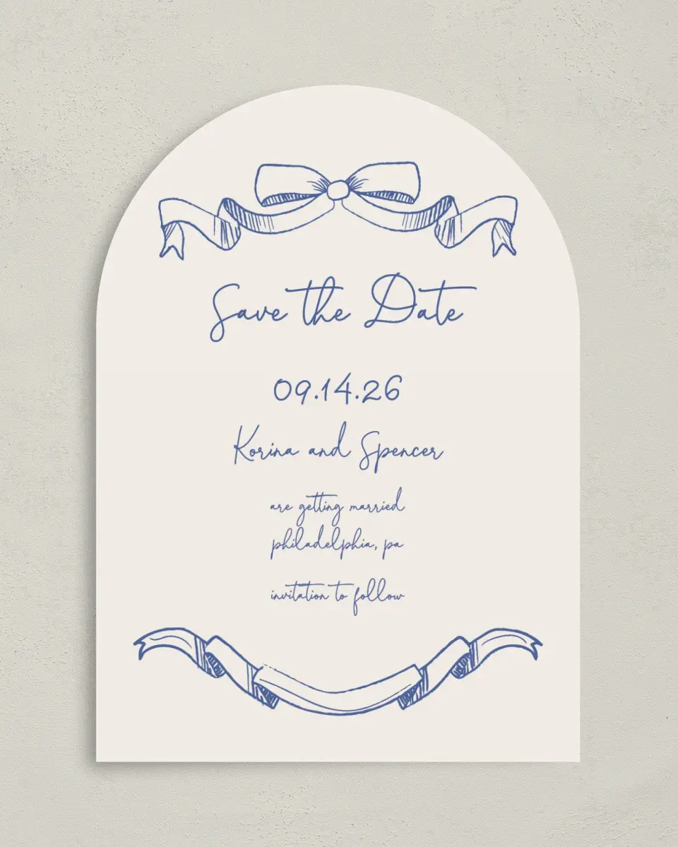 This is a 5" x 7" Arch Save the Date called Sketched Bow printed in full color on Premium Smooth paper