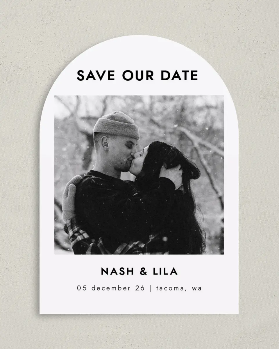 This is a 5" x 7" Arch Save the Date called Snowy Kisses printed in full color with Gold foil on Premium Smooth paper