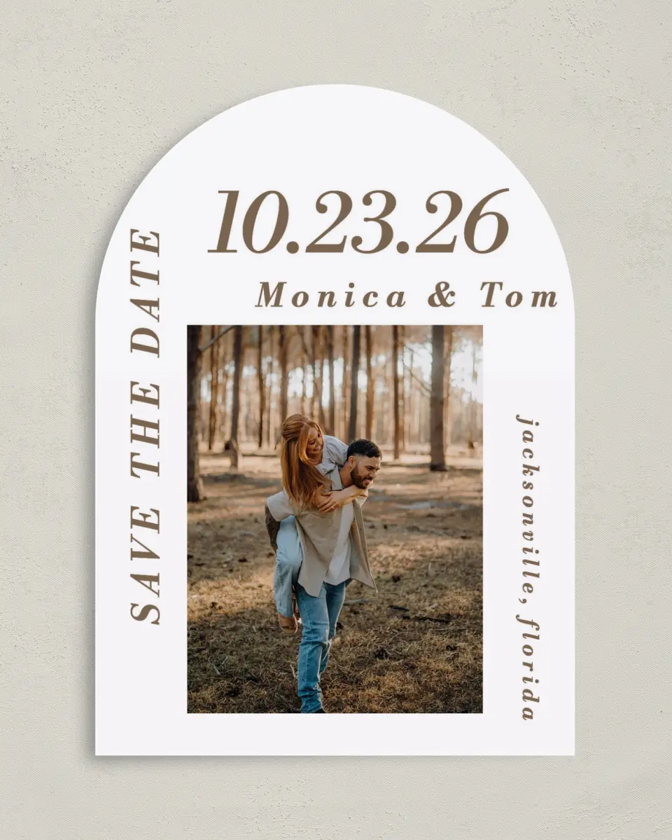 This is a 5" x 7" Arch Save the Date called All I Need printed in full color with Silver foil on Luxe Satin paper