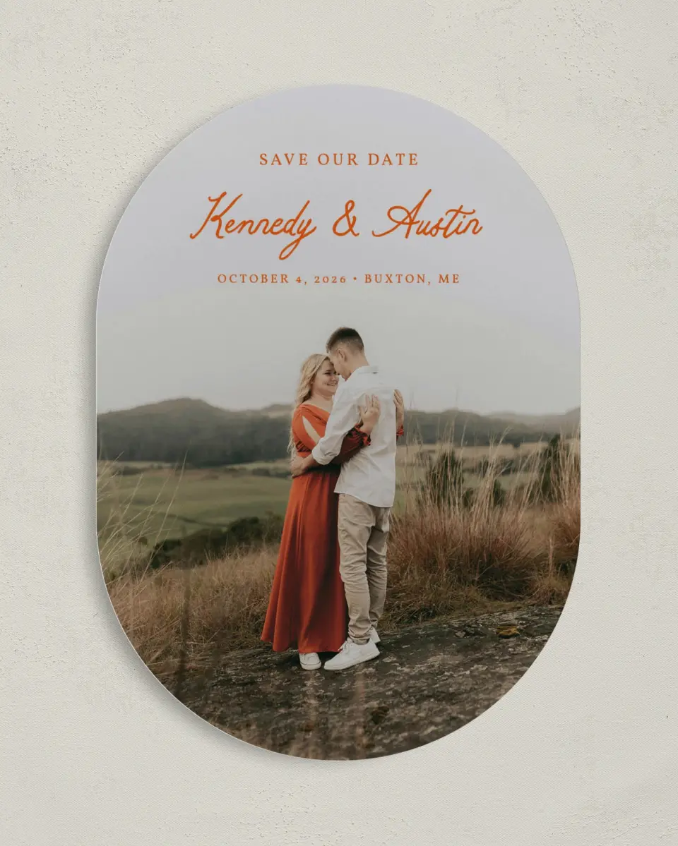 This is a 5" x 7" Save the Date Card called The Kennedy printed in full color with Silver foil on Luxe Satin (coated) paper