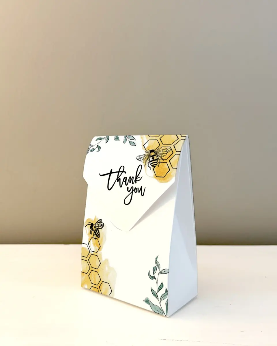 This is a 3.5" x 5.5" Wedding Favor Boxe called Mama to Bee printed in full color with Gold foil