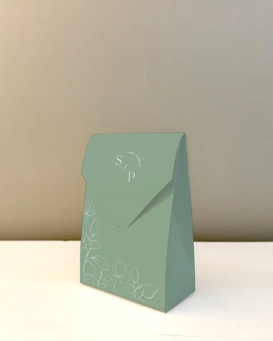 This is a 3.5" x 5.5" Wedding Favor Boxe called The Sadie printed in full color with Silver foil