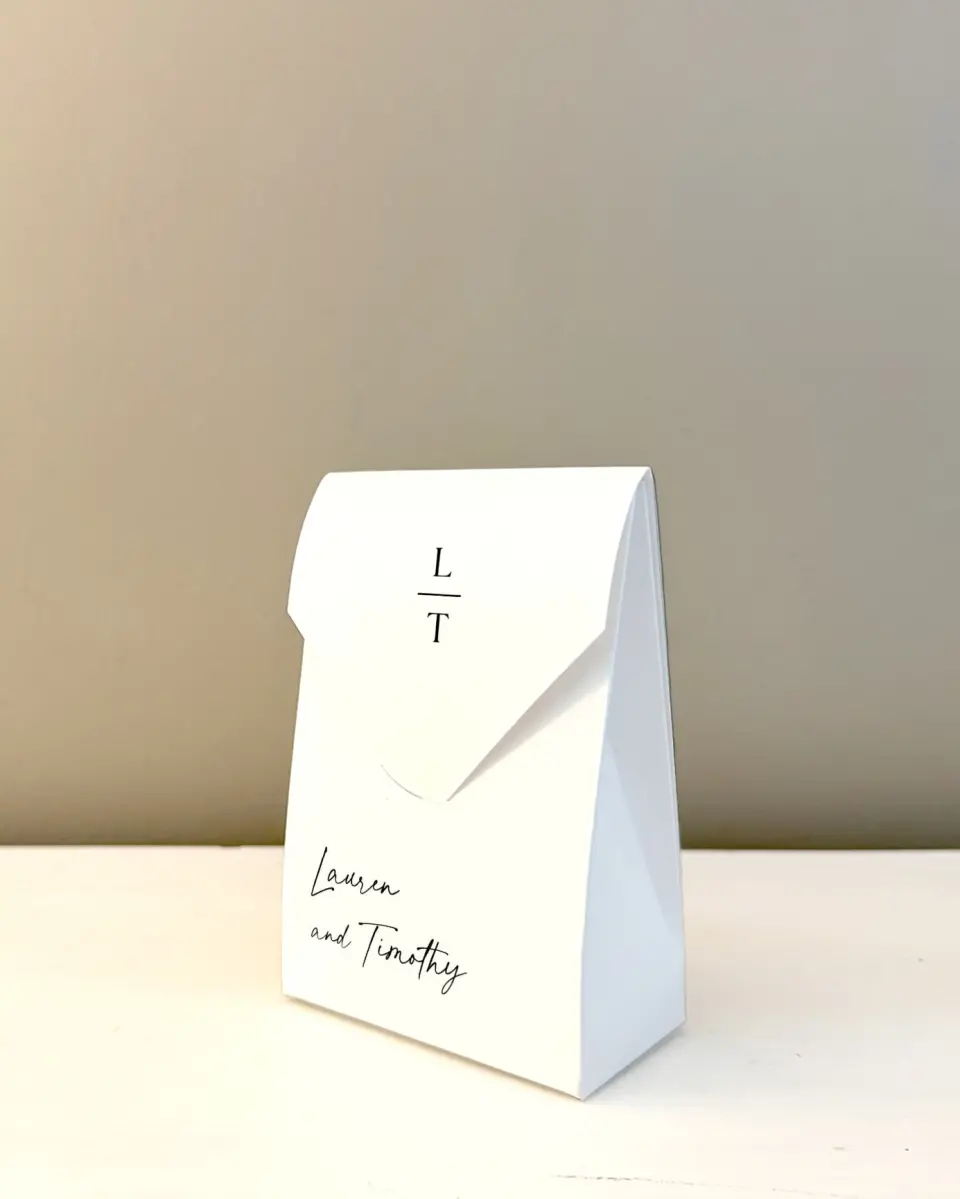 This is a 3.5" x 5.5" Wedding Favor Boxe called The Lauren printed in full color with Gold foil