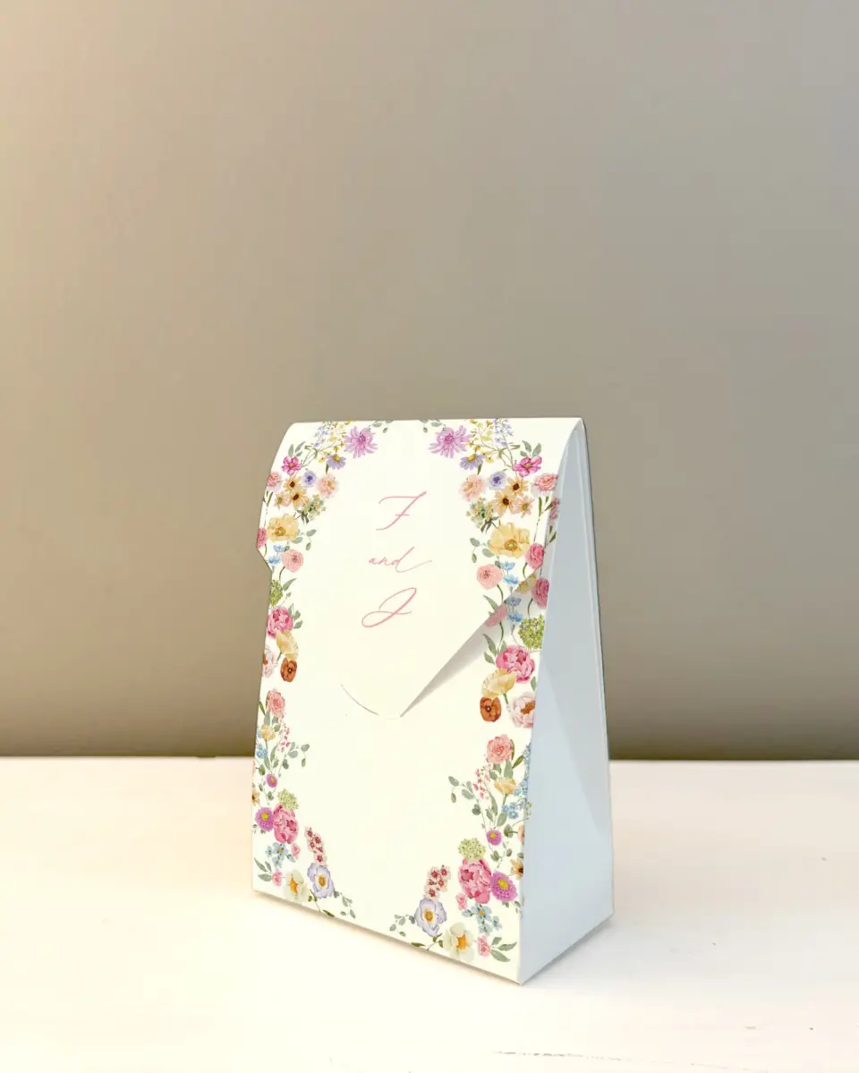 This is a 3.5" x 5.5" Wedding Favor Boxe called The Florence printed in full color with Rose Gold foil