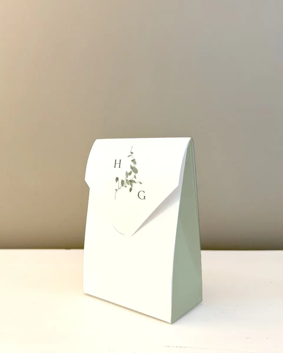 This is a 3.5" x 5.5" Wedding Favor Boxe called The Hailey printed in full color with Silver foil