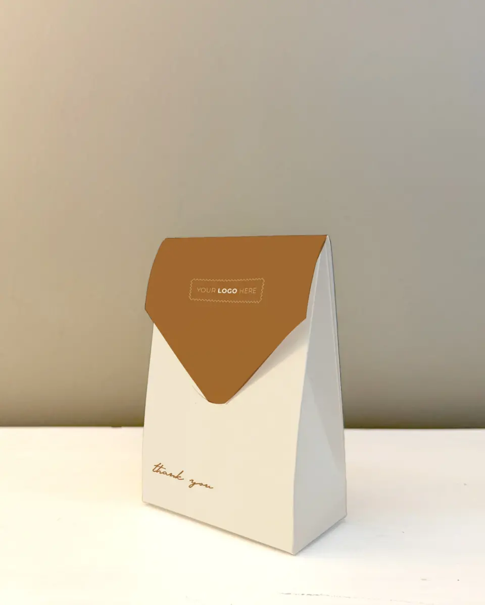 This is a 3.5" x 5.5" Business Favor Boxe called Urban Essence printed in full color with Rose Gold foil